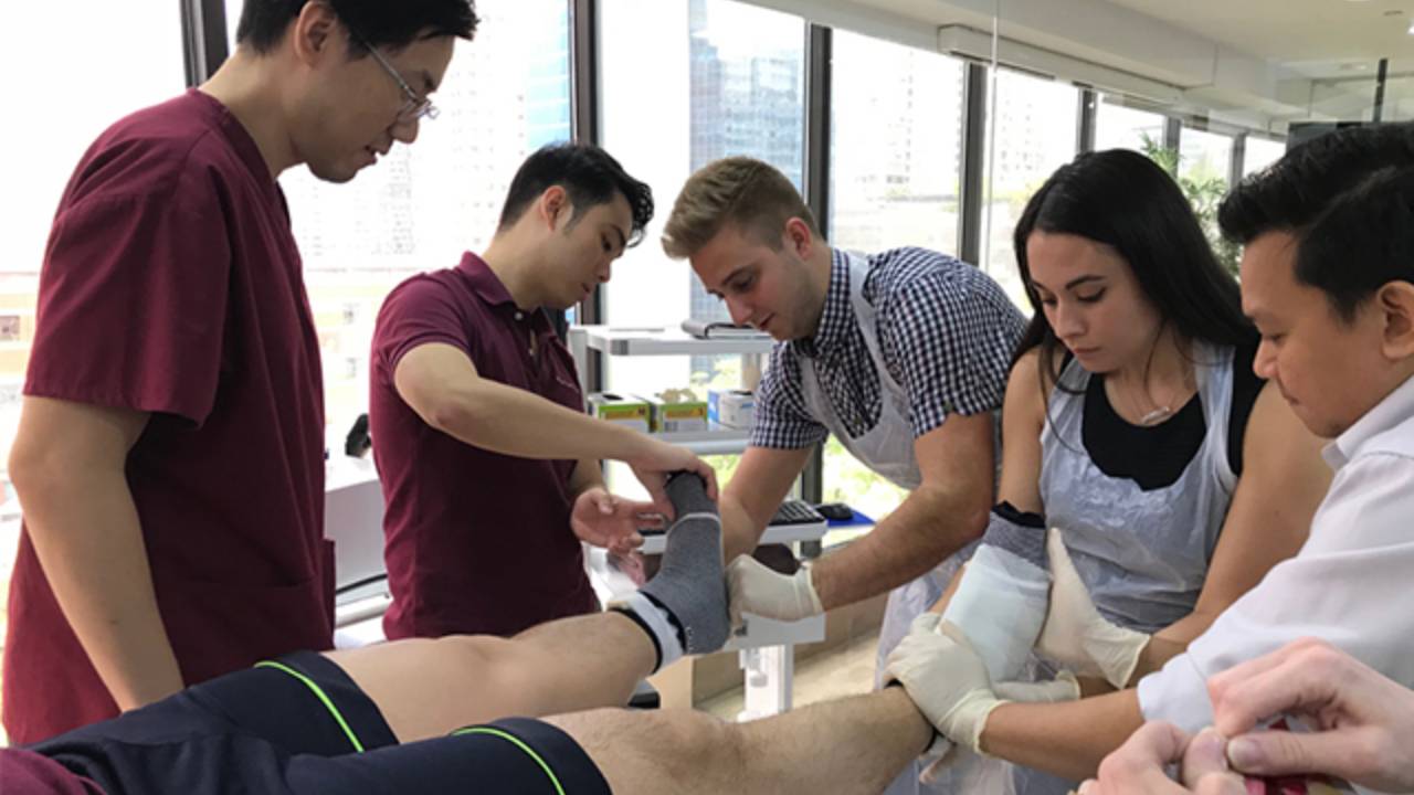 Podiatrist helping Interns | East Coast Podiatry