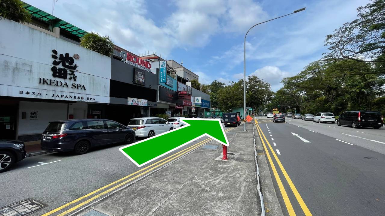 Continue walking straight. You will pass by several shophouses along the way
